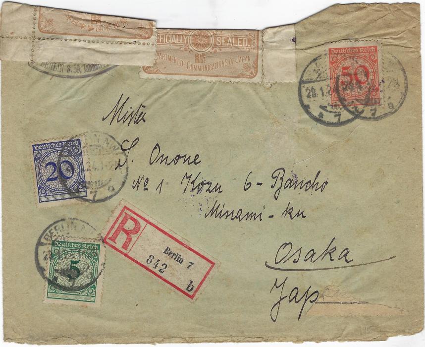 Japan 1924 (28.1.) registered cover from Berlin, Germany to Osaka, the envelope damaged in transit and two Officially Sealed labels applied at top, arrival backstamps, remains of delivery label at base.