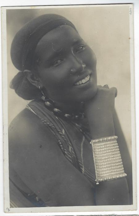 Italian Colonies (Somalia) 1928 picture postcard of young lady to italy franked on reverse 1926-30 10c red and 20c deep violet tied by two rare violet Villagio Duca Abruzzi Somalia Italiano; rare cancel a little unclear otherwise fine and fresh condition.