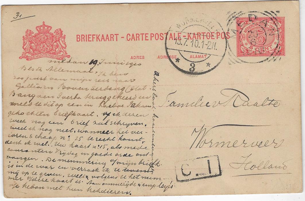 Netherland Indies (Picture Stationery) 1910 5c stationery on thick stock with photographic image on reverse of locals with a fine horned Oxen pair, used with Medan square circle date stamp, to Wormerveer with arrival cds to left; fine condition.