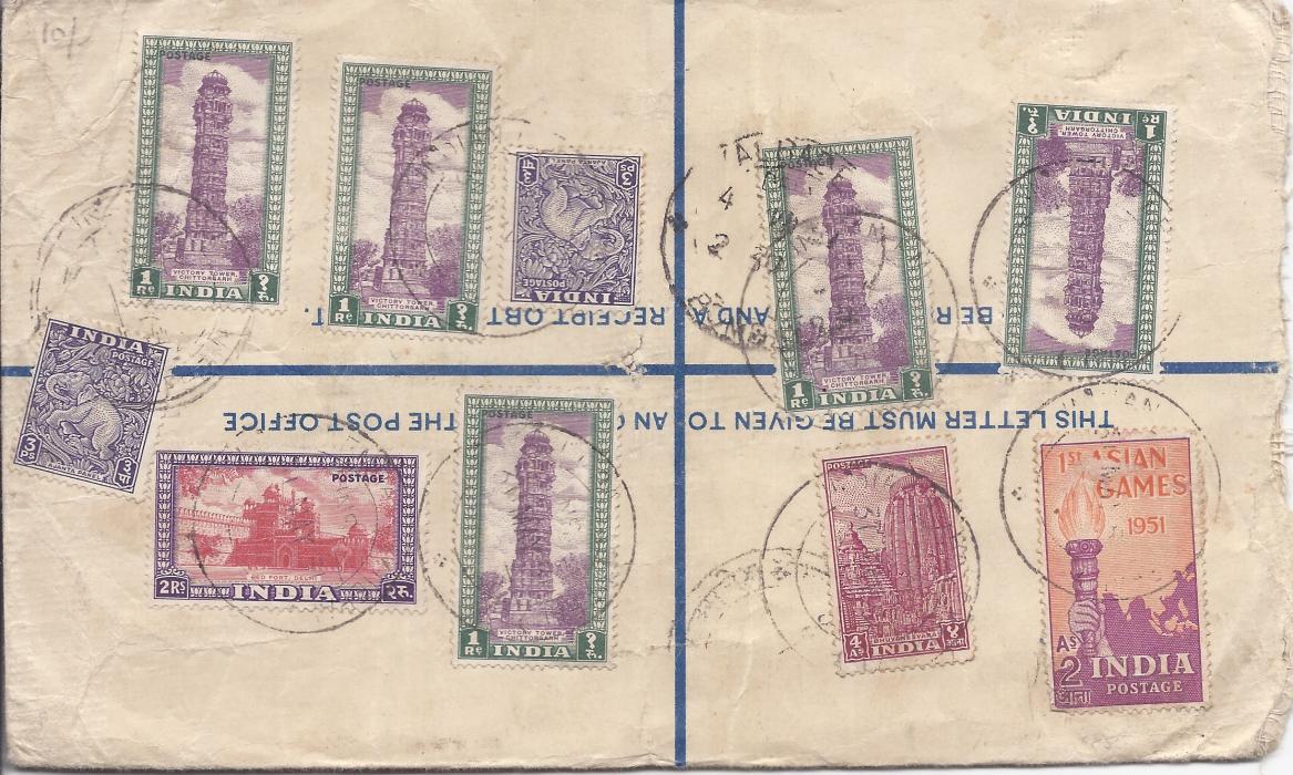 Nepal 1951 6a. registration stationery envelope, insured cover for Rs 5000 to Bombay, bearing a multi franking on reverse at 7r. 6a. 6p. tied indistinct cds, front bearing registration label INDIAN EMBASSY NEPAL; small central filing hole, a fine franking.