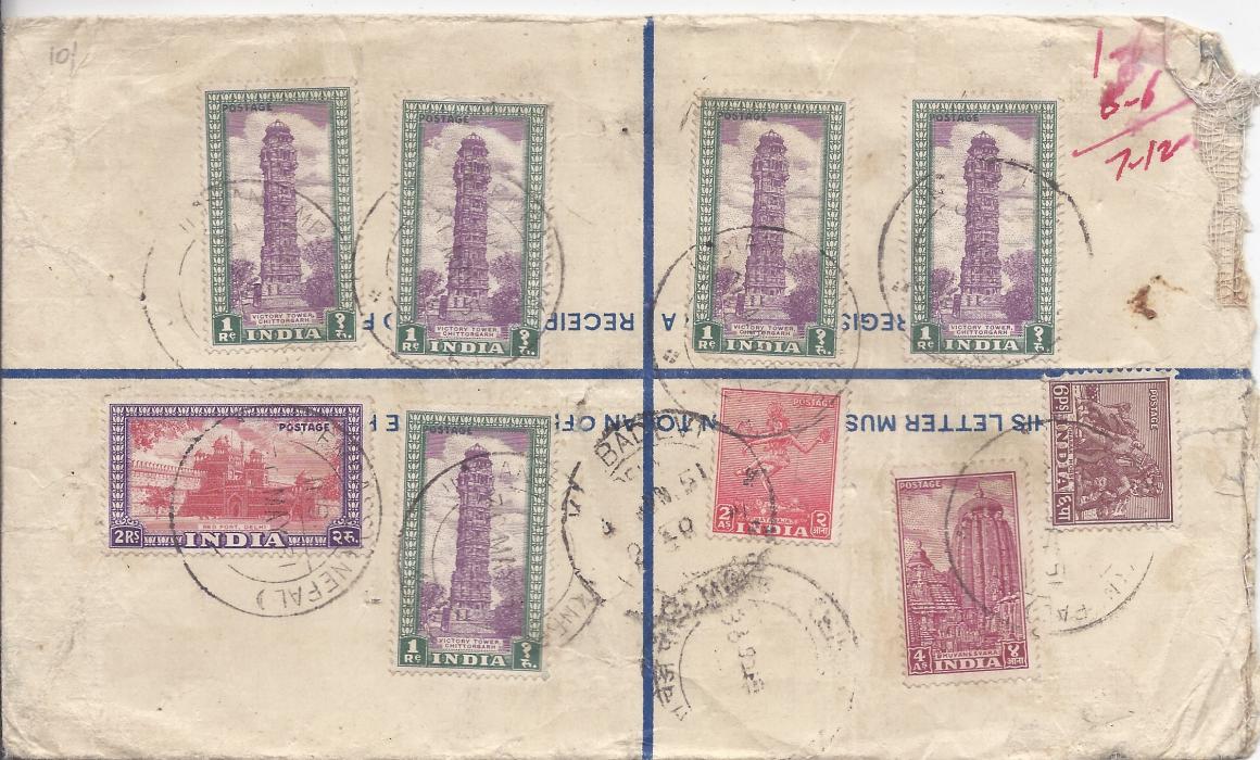 Nepal 1951 6a. registration stationery envelope, insured cover for Rs 5000 to Bombay, bearing a multi franking on reverse at 7r. 6a. 6p. tied indistinct cds, front bearing registration label INDIAN EMBASSY NEPAL; small central filing hole, a fine franking.