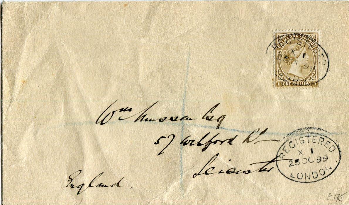 FALKLAND ISLANDS 1899 Envelope to England franked QV 1s yellow-brown cancelled on arrival by oval REGISTERED LONDON X 1 ds with oval registered Leicester arrival bs, few small stains on reverse not affecting front. Envelope with some wrinkles.