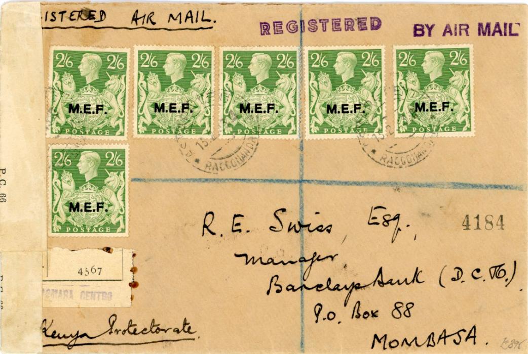 BRITISH OCCUPATION OF ITALIAN COLONIES BRITISH OCCUPATION OF ITALIAN COLONIES - Middle East Forces: 1943 (15.2) Registered envelope to Kenya franked GB 2s.6d. yellow-green (6) tied by ASMARA CENTRO / RACCOMANDATO c.d.s. with native registered label alongside, two ‘Opened by Examiner ZZ/37471’ censor strips, backstamps including registered Mombasa arrival, scarce high franking.