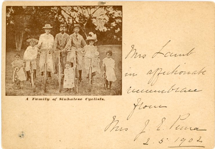 CEYLON CEYLON: 1902 2c. mustard yellow illustrated postal stationery card, on front large vignette entitled ‘A Family of Sinhales Cyclists’, message written alongside dated 2.5.1902, fine except for a spike hole bottom right. Rare. Thematic BICYCLES.