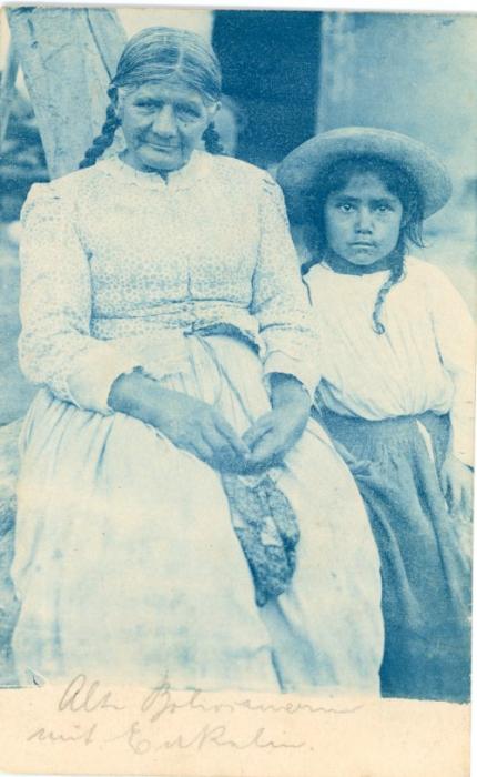 BOLIVIA BOLIVIA: ca1902 2c. blue illustrated postal stationery card fine mint depicting old lady and young girl.