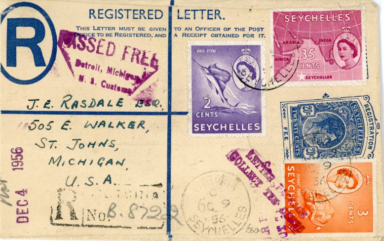 SEYCHELLES SEYCHELLES: 1956 (OC 9) KGVI 20c registered postal stationery envelope to USA uprated 1954-61 2c + 3c + 35c tied by Victoria C cds with reg. boxed cachet alongside, various custom markings applied on arrival, St Johns Mich. Arrival backstamp, fine.