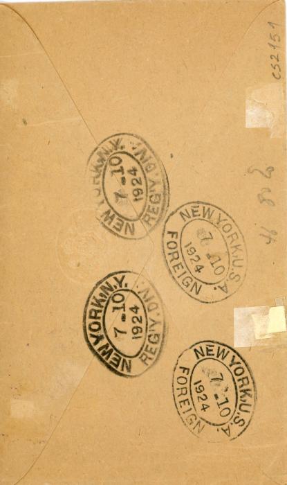 TURKS ISLAND TURKS ISLAND: 1924 (JY !) Registered OHMS envelope to England with violet boxed POSTAGE/PAID in unrecorded type (Challis has thin unseriffed letters), oval Registered Turks Island ds and Turks Island cds, both in the same blue shade, sent from the Postmaster, various New York transit oval bss, fine.