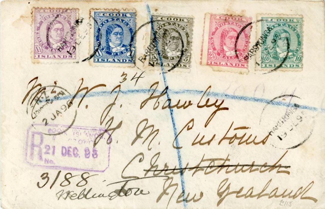 COOK ISLANDS COOK ISLANDS: 1895 (19/12) Registered envelope to New Zealand franked Queen Makea 1d + 1 1/2d + 2 1/2d + (corner defect) + 5d + 10d all tied Rarotonga cdss with boxed registered Cook Islands/Rarotonga in violet, redirected on arrival with Auckland and Wellngton arrival bss, some gum staining around perfs.