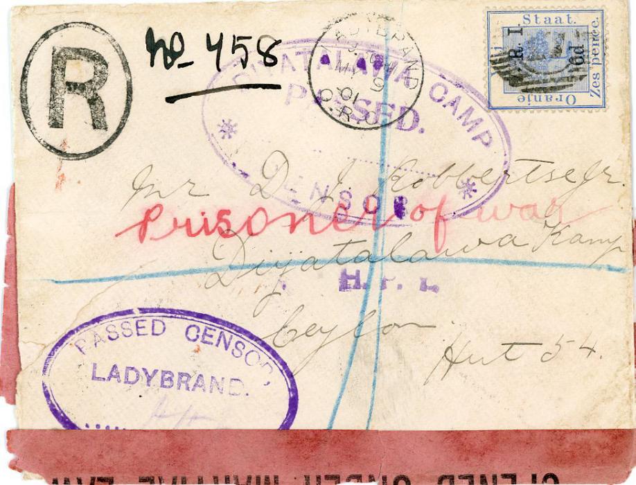 SOUTH AFRICA / ORANGE FREE STATE SOUTH AFRICA / ORANGE FREE STATE: 1901 (My 9) registered envelope to POW at DIYATALAWA CAMP in Ceylon franked V.R.I. 6d ovpt on 6d blue, with Ladybrand O.R.C. dispatch and Passed Censor oval censor similar for Diyatalawa, Opened under Martial Law censored strip damaged on opening