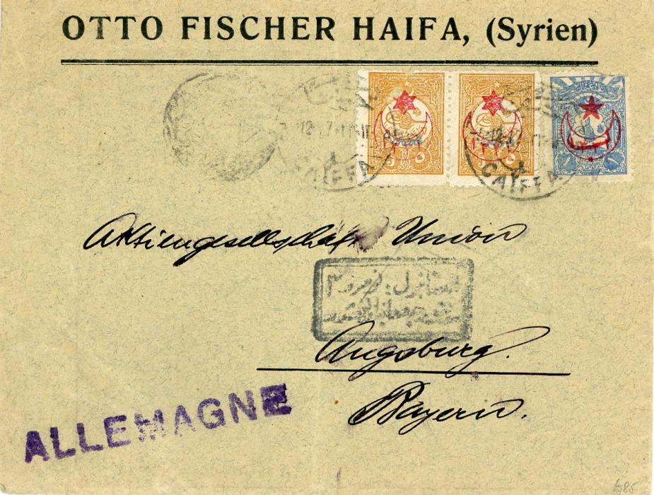 OTTOMAN PALESTINE OTTOMAN PALESTINE: 1917 Envelope imprinted Otto Fischer Haifa (Syrien) addressed to Germany franked 1909-11 5pa brown-ochre pair + 1pi blue all with 1915 Provisional ovpt, 5 pa pair also ovpt. 1908 printed matter hs in blue, all tied CAIFFA bilingual cds, fine