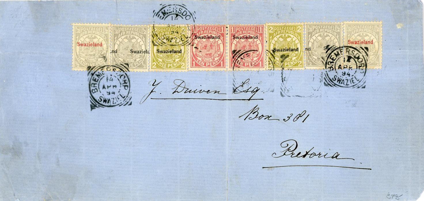 SWAZILAND SWAZILAND: 1894 (14 Apr) Long blue env. to Pretoria franked 1/2d grey (2 - both with misplaced ovpts) in black +1/2d grey with red ovpt. (2) + 1d pair +2d olive (2) all tied BREMERSDORP Swaziel. squared cds with arrival bs, some horiz. creasing affecting franking and vertical crease through perfs of 1d pair, ex Duiven correspondence